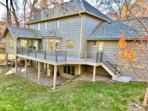 A house with a composite deck and aluminum railing.