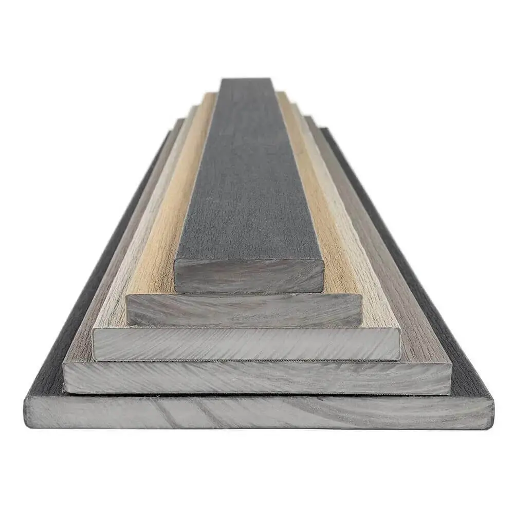 Stack of six rectangular wooden planks of varying sizes and colors, arranged in a stepped formation from largest at the bottom to smallest at the top—ideal inspiration for DIY deck materials or your next deck install project.